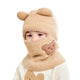 Cagoule Bébé Fille Beige sur fond blanc porter par un bebe
