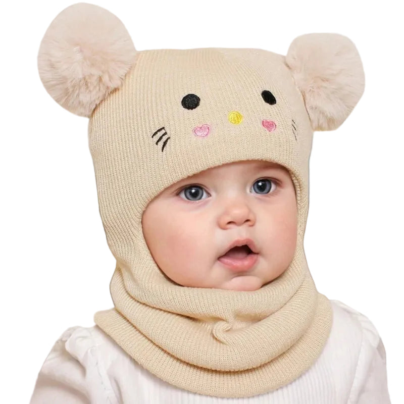 Cagoule Bébé Sable sur fond blanc porter par bebe