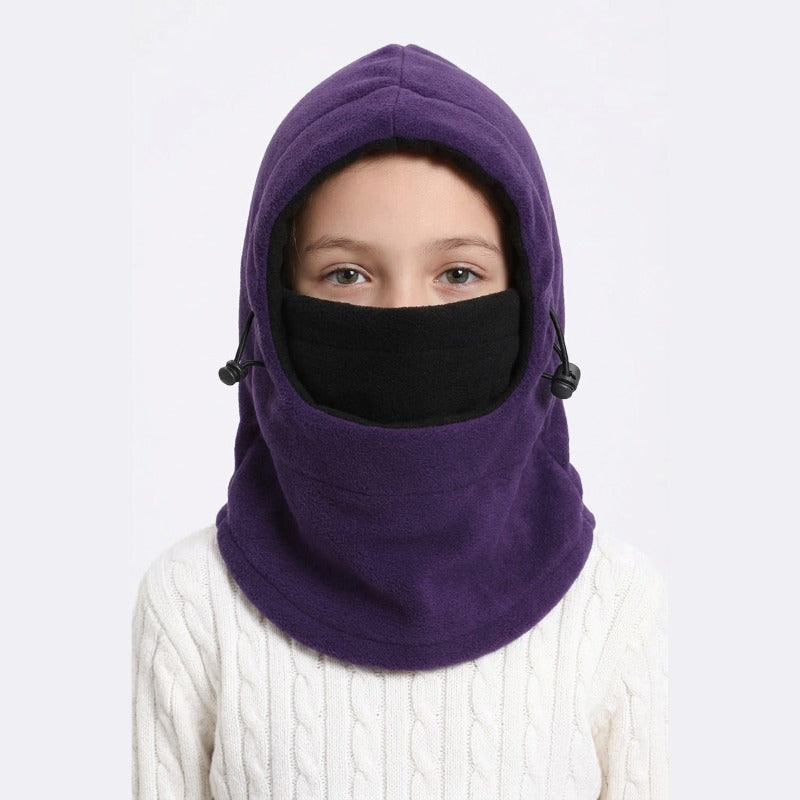 Cagoule Enfant Ski Violette portée sur fond blanc