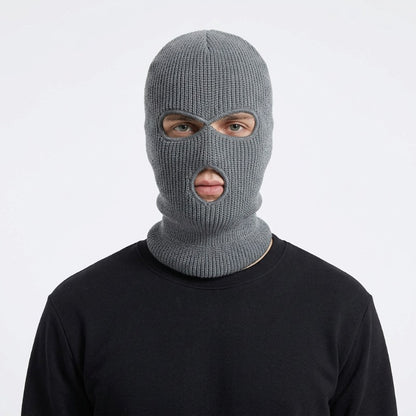 Cagoule Grise Homme portée sur fond blanc