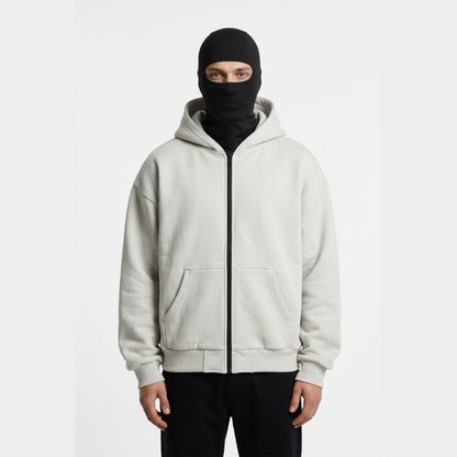 Cagoule Veste Grise portée sur fond blanc